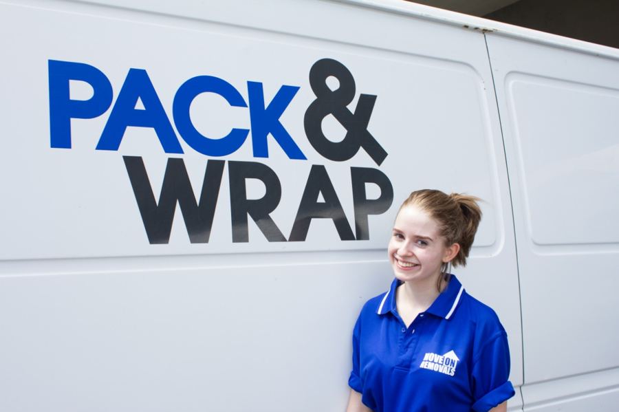 Move On Removals team member beside the Pack and Wrap van