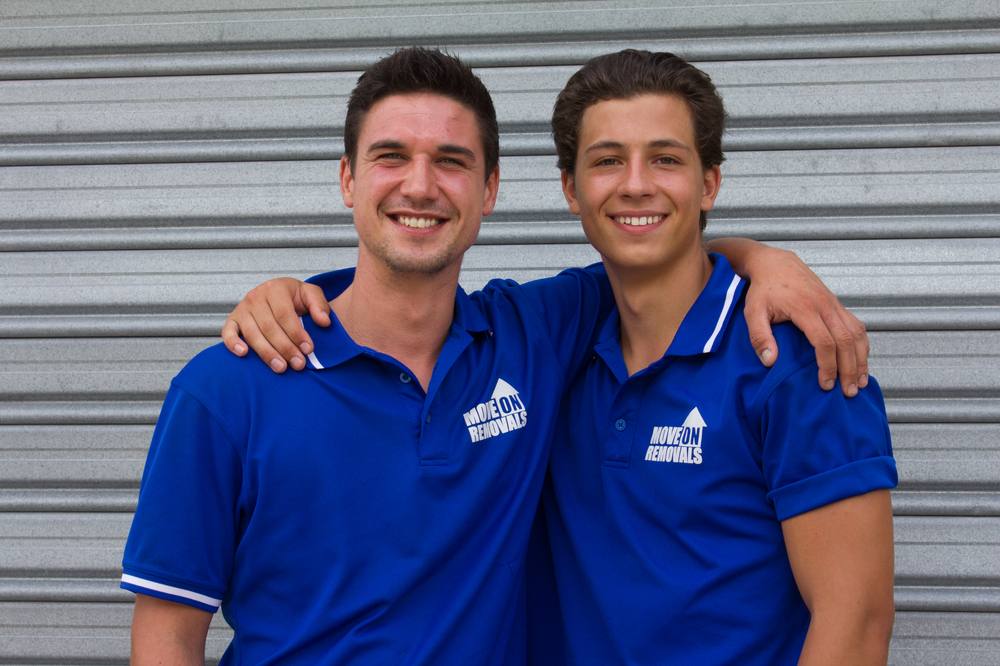 Two Move On Removals crew members in branded uniform