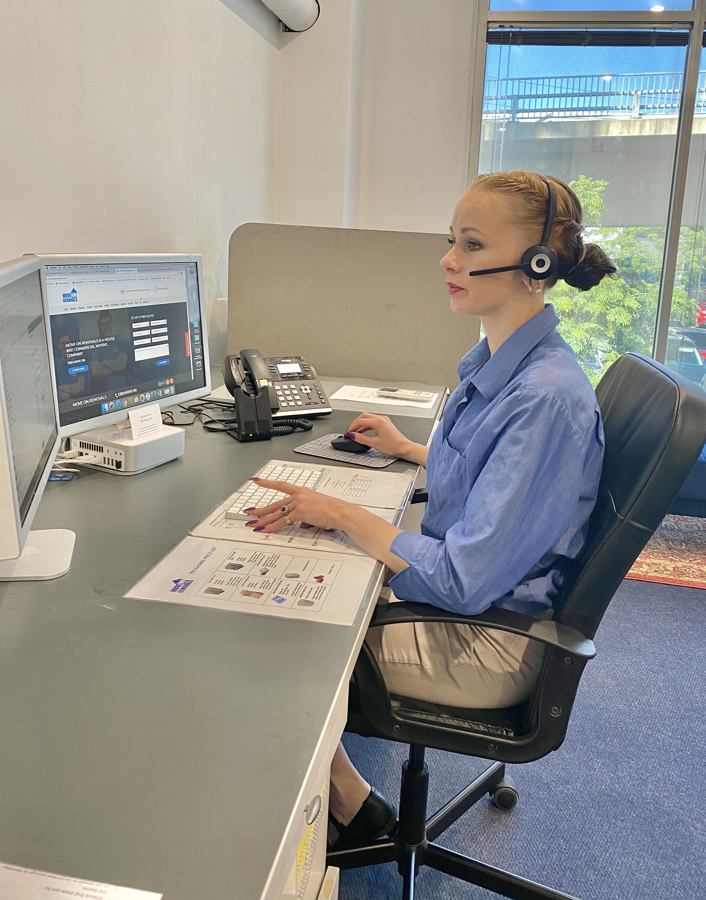 Move On Removals team member taking a call to arrange a video assessment