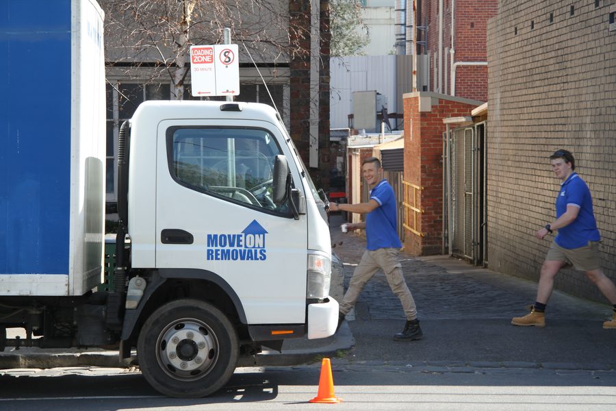 Move On Removals crew and branded truck on-site